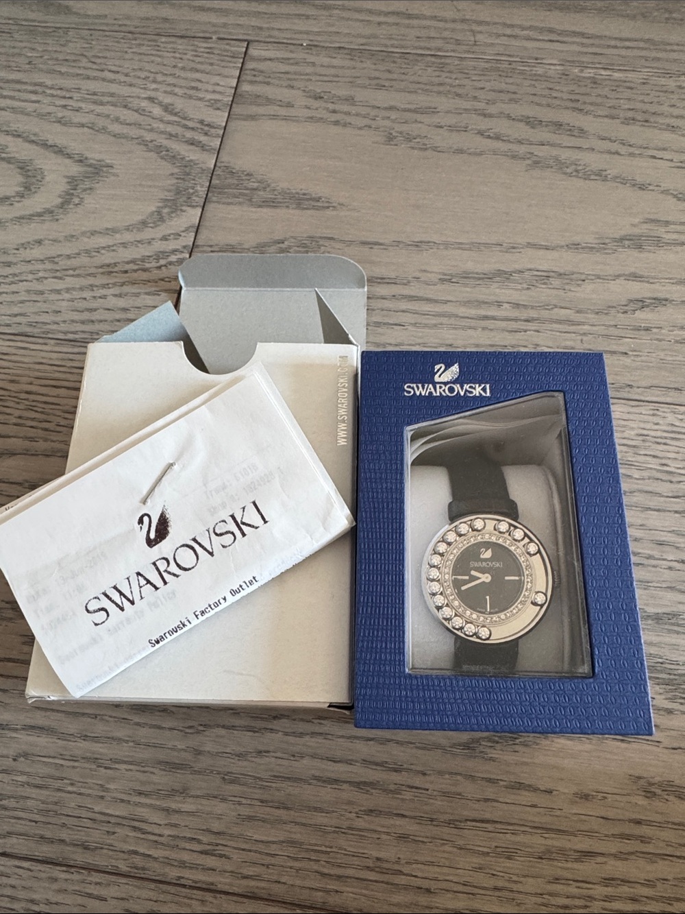 Swarovski Black Crystal Bezel Women's Watch